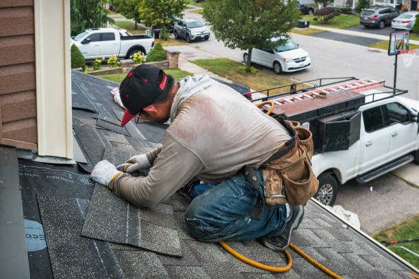 Professional Roofing technician working in Port Crane, NY